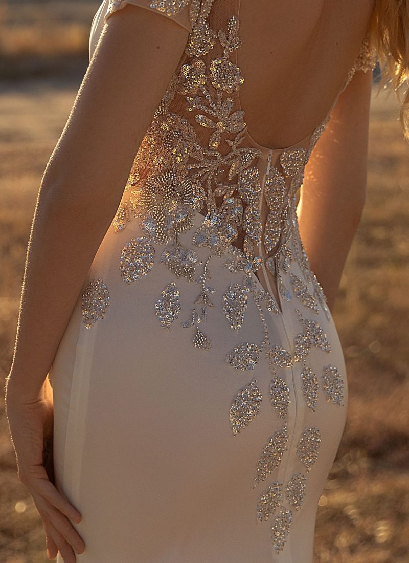 fitted low backed wedding dress